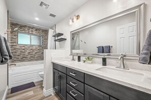 Hair dryer, towels, soap, shampoo