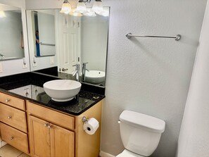 Hair dryer, towels, soap, toilet paper