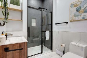Shower, hair dryer, shampoo