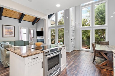 Sandy Beach Hideaway.  Cozy and Bright. Entire house steps from the Sandy Beach!