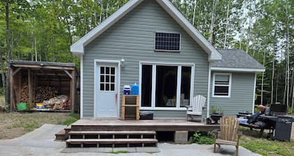 Cozy little cabin in the woods.