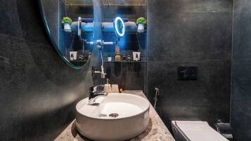 Shower, towels, soap, toilet paper