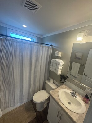 Hair dryer, towels, soap, toilet paper