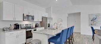 2 New, Stunning homes with Heated Saltwater Pools and Piers!
