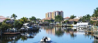 2 New, Stunning homes with Heated Saltwater Pools and Piers!