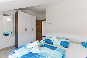 1 chambre, fer et planche à repasser, Wi-Fi gratuit, draps fournis