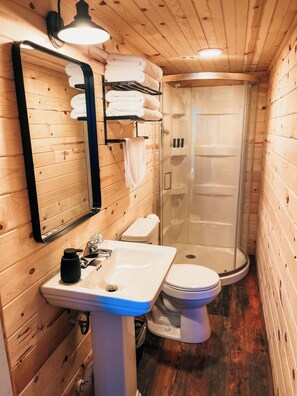 Shower, towels, soap, toilet paper - The Cabins at Bent Pine Ranch ~ Cabin #1 (Locust Grove)