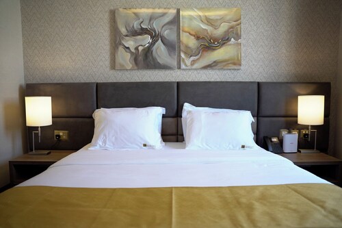 Abraj suites hotel- 1 Bedroom, 2 Bathroom, Living Room and kitchen