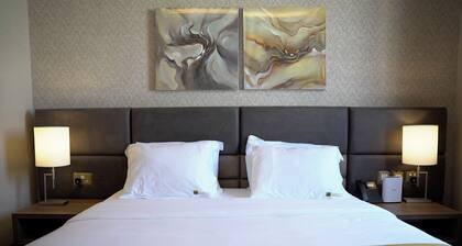 Abraj suites hotel- 1 Bedroom, 2 Bathroom, Living Room and kitchen