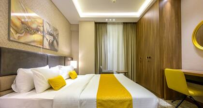 Abraj suites hotel- 1 Bedroom, 2 Bathroom, Living Room and kitchen