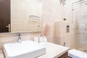 Studio, City View | Bathroom | Shower, free toiletries, slippers, towels