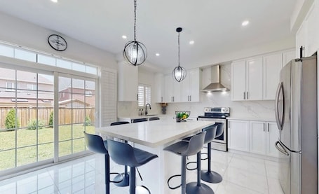 Fridge, microwave, oven, stovetop. Modern family friendly 4-bedroom home away from home in Oshawa!