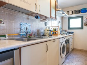 Fridge, oven, cookware/dishes/utensils