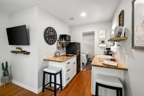 Fridge, microwave, cookware/dishes/utensils