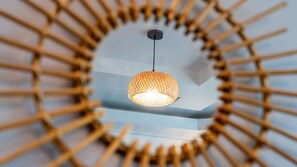 A circular, lattice-style pendant light fixture centered above a white ceiling. - Anmyeon-do Ssong Pension (Taean)