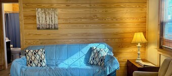 Charming cabin nestled in the woods in Andalusia, AL