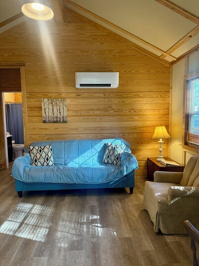 Charming cabin nestled in the woods in Andalusia, AL