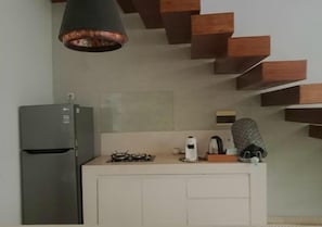 Fridge, coffee/tea maker, electric kettle, cookware/dishes/utensils