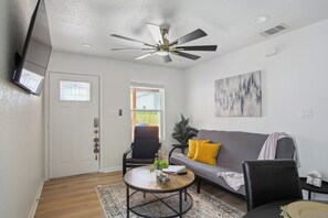 House (3 Bedrooms) | Living area | 50-inch TV with digital channels