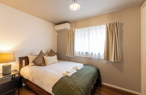 Blackout curtains, iron/ironing board, free WiFi, bed sheets