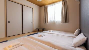 Blackout curtains, iron/ironing board, free WiFi, bed sheets