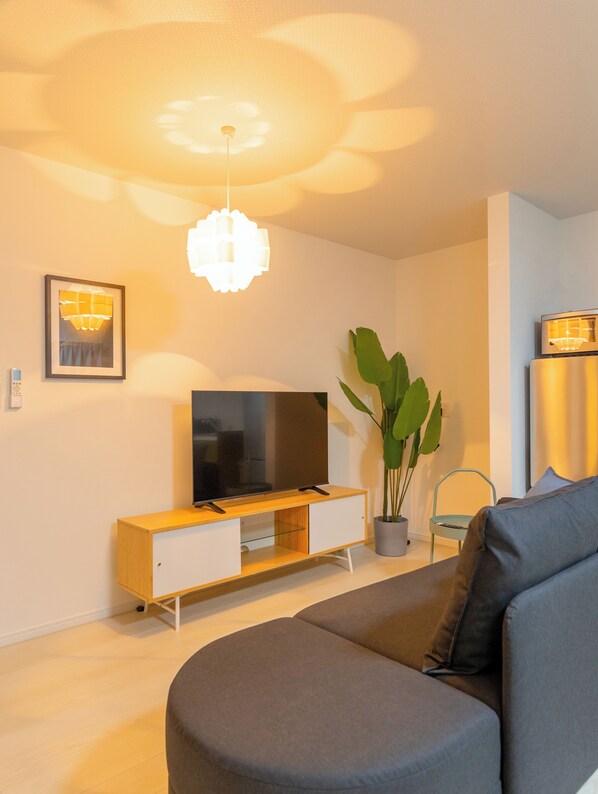 Elite House | Living area | Flat-screen TV