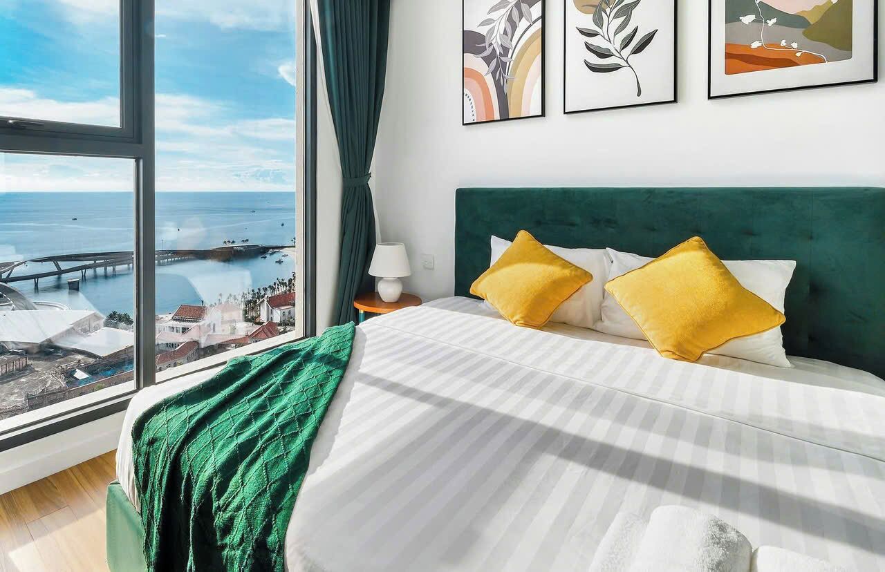 Apartamento família, 2 quartos, para não fumantes, vista para o mar | 1 quarto, individualmente mobiliados, escrivaninha