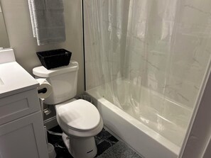 Hair dryer, towels, soap, shampoo