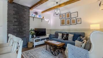 Standard House, Multiple Bedrooms (BalChill House With Sauna And Jacuzzi) | Living area | 21-inch Smart TV with cable channels