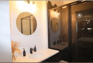 Shower, hair dryer, towels, soap