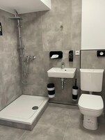 Classic Double Room | Bathroom | Shower, hair dryer, towels, soap