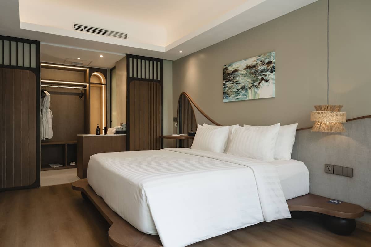 Deluxe Double Room, 1 King Bed, Pool View | 1 bedroom, in-room safe, iron/ironing board, free WiFi