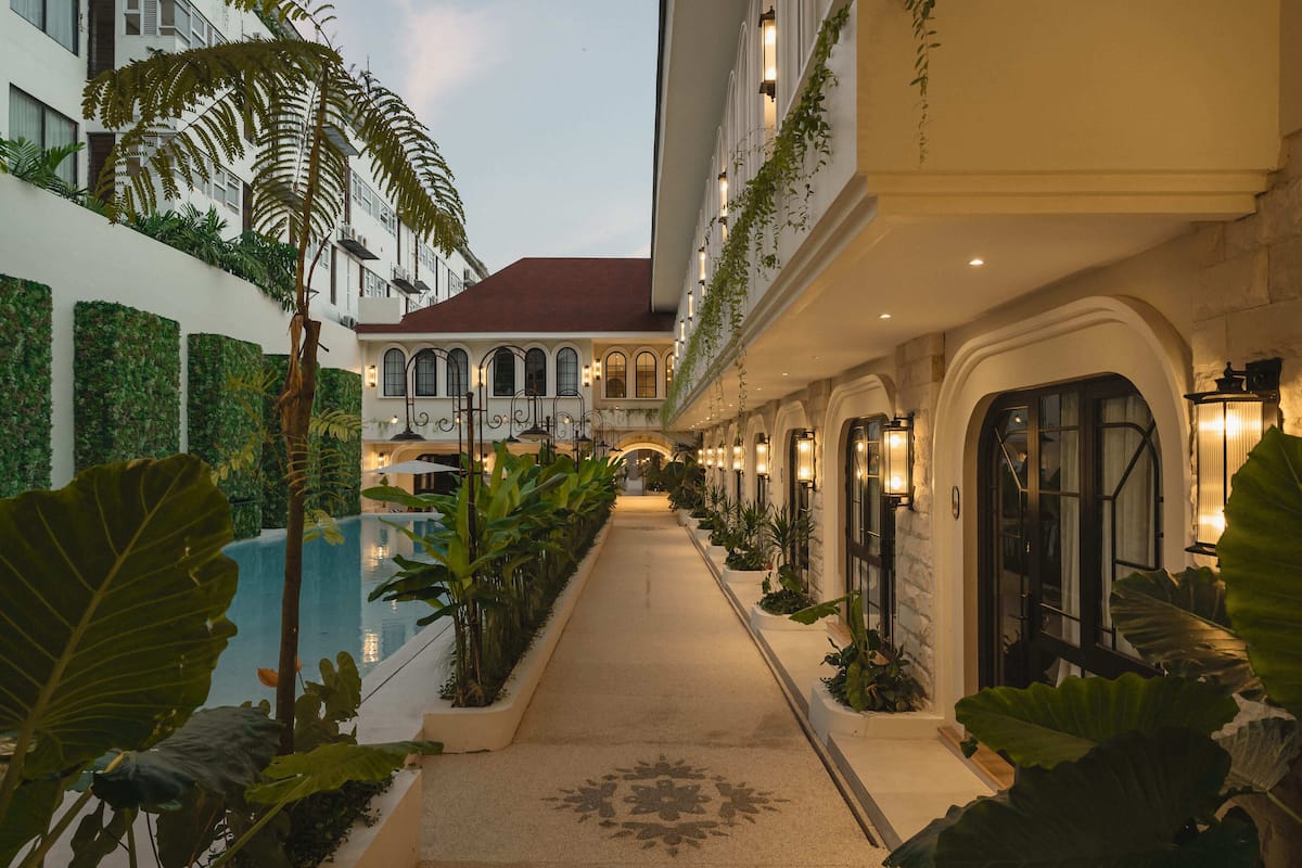 Deluxe Room Pool Side | 1 bedroom, in-room safe, iron/ironing board, free WiFi
