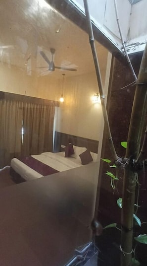 Habitación Deluxe, vista al jardín | Escritorio, espacio para trabajar con laptop y wifi gratis
