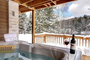 Outdoor spa tub - Huge Waterfront Modern Cottage on the Rouge River (Unknown)