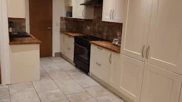 Apartment | Private kitchen | Fridge, oven, stovetop, dishwasher
