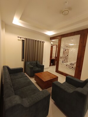 Suite familiale, vue sur le complexe | Aire de séjour