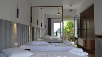 Habitación triple Deluxe, vistas al mar | Wifi gratis
