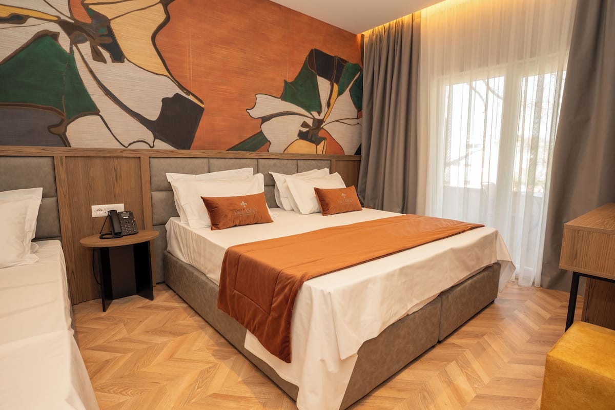 Suite monolocale, vista mare | Ferro/asse da stiro, Wi-Fi gratuito, lenzuola