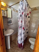 Double Room, Balcony | Bathroom | Shower, hair dryer, towels, soap