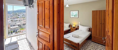 Quadruple Room, Balcony | Desk, laptop workspace, free WiFi, bed sheets
