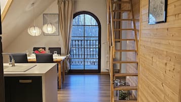Apartment, 2 Bedrooms, Jetted Tub | Living area | Flat-screen TV