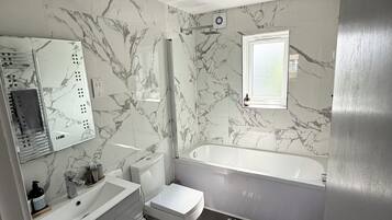 Shower, free toiletries, hair dryer, towels
