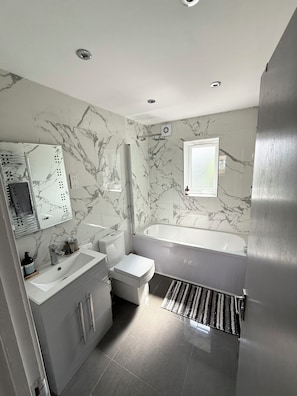 Shower, free toiletries, hair dryer, towels