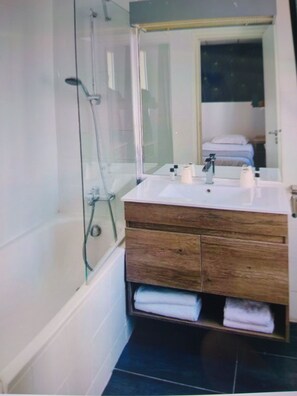 Hair dryer, towels, soap, toilet paper