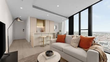 Apartment, 1 Queen Bed, Non Smoking | Living area | 36-inch Smart TV with satellite channels
