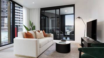 Apartment, 1 Queen Bed, Non Smoking | Living area | 36-inch Smart TV with satellite channels