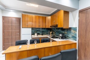 Family Apartment, Pool View | In-room safe, laptop workspace, blackout drapes, soundproofing