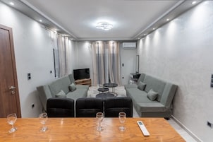 Family Apartment, Pool View | In-room safe, laptop workspace, blackout drapes, soundproofing