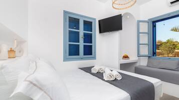 Minibar, espacio para trabajar con laptop, insonorización y wifi gratis